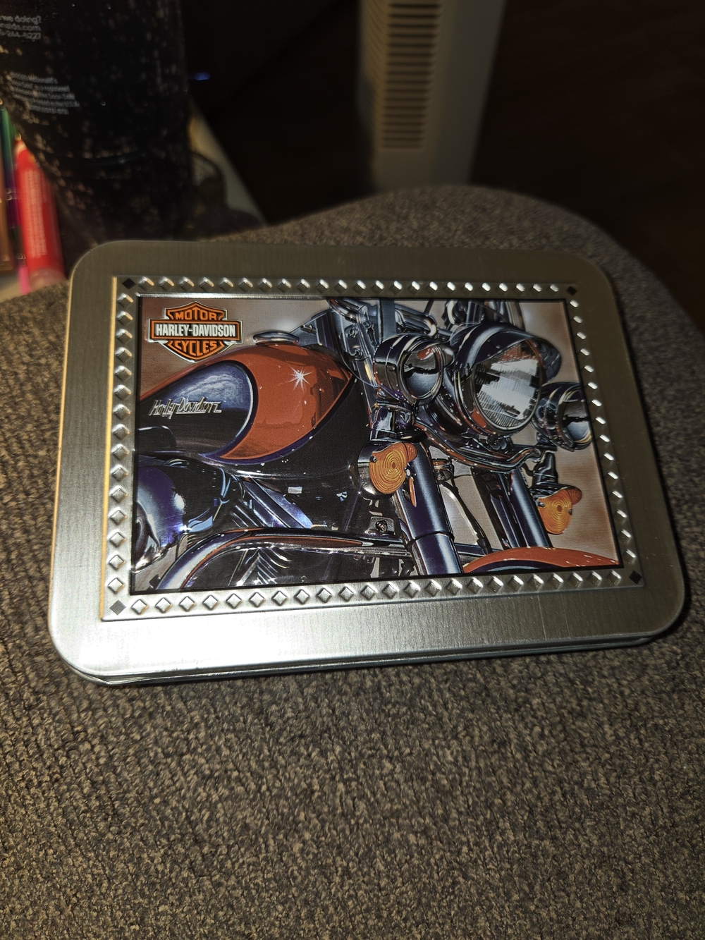 Harley-Davidson Silver Tin with Orange Motorcycle Graphic